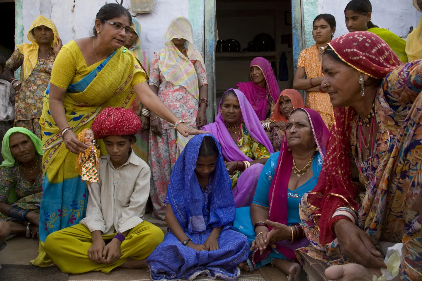 Snehlata (in glasses) explains the harmful effects of child marriage to women in Agolai Village, Jodhpur District, Rajasthan State.