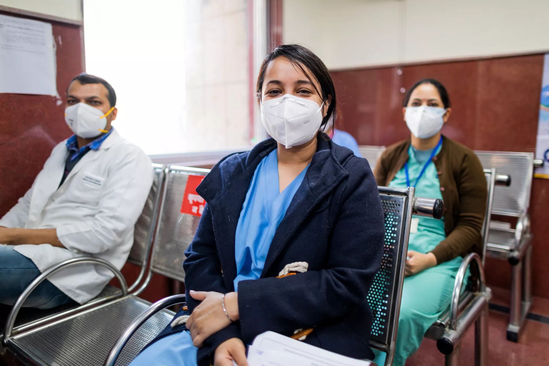 Health workers awaiting their turn to be vaccinated 