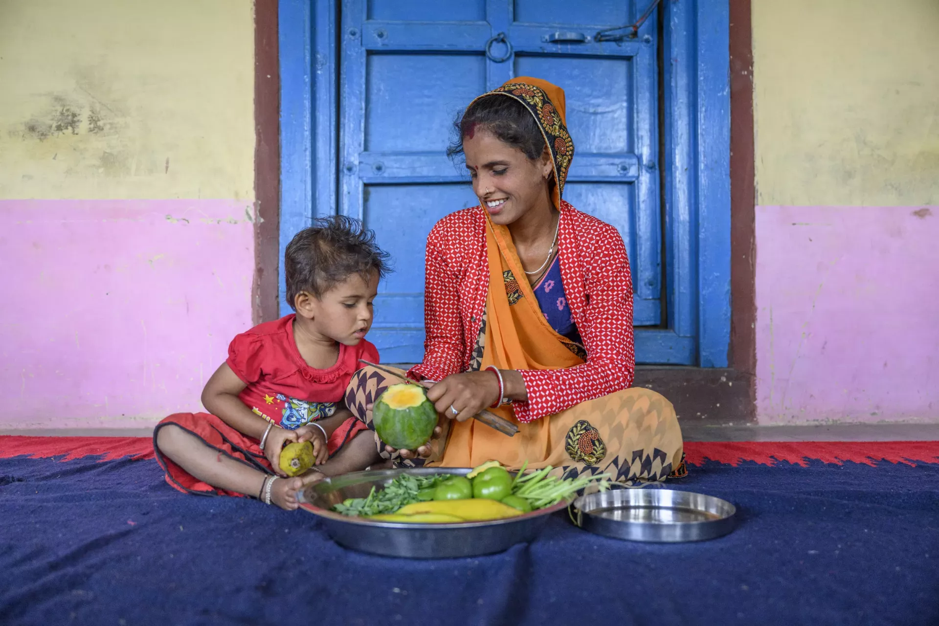 Azina &nbsp;grows vegetables in her kitchen garden .