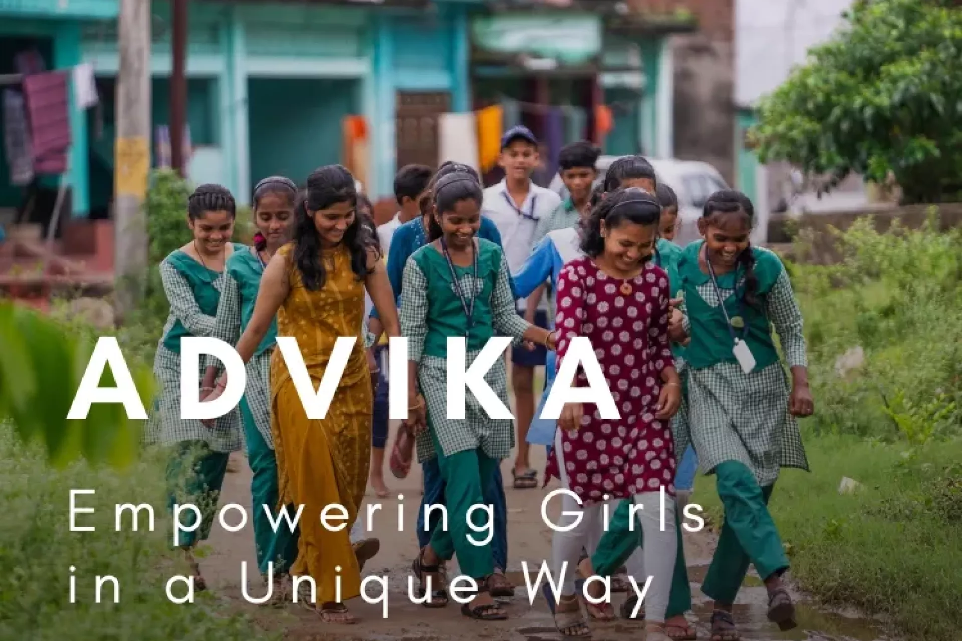 The Advika group make their way through their village to the Anganwadi Centre