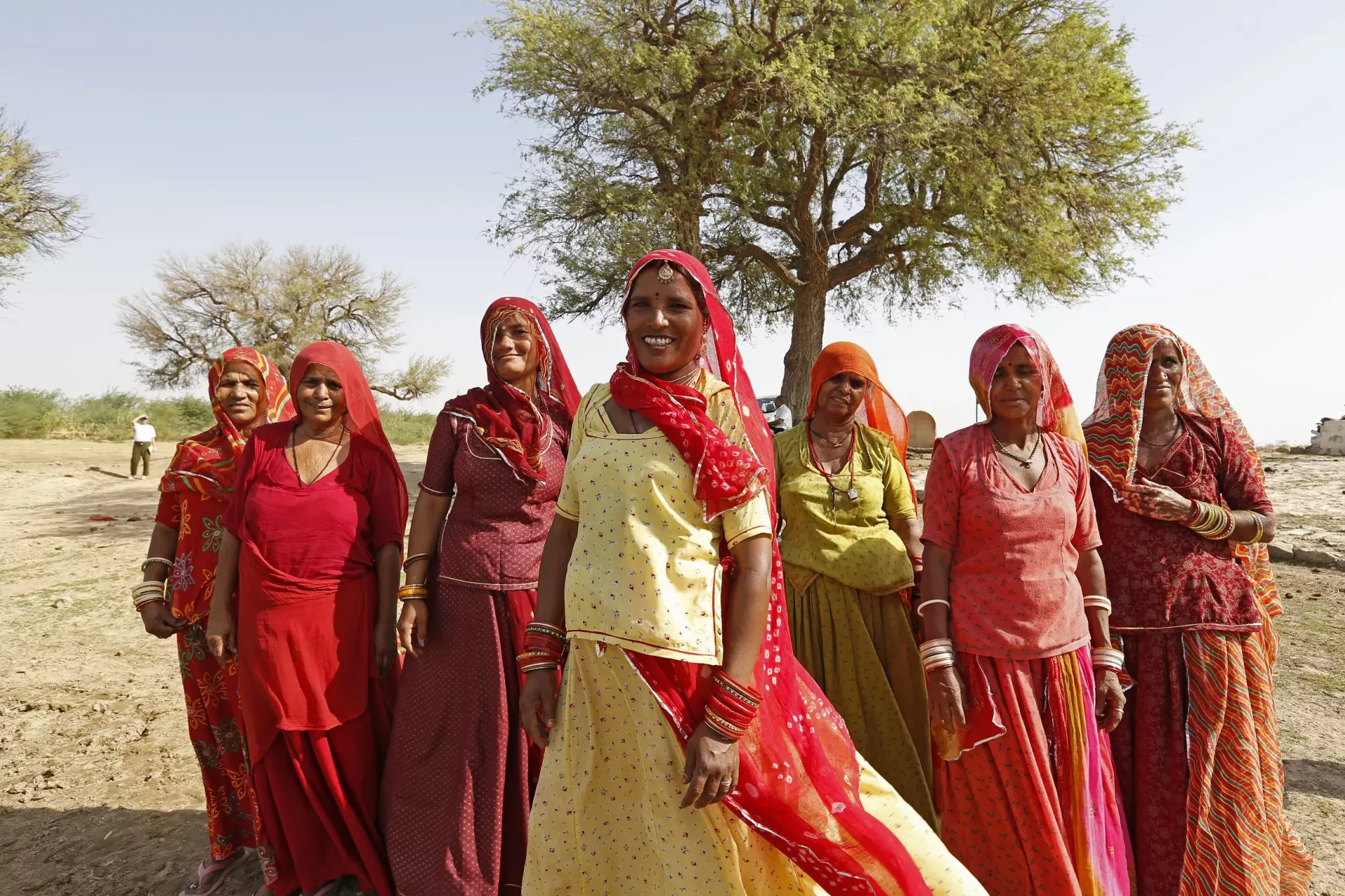 Leela Khatun, 40, stands at the center alongside her fellow Jal Sahelis -  from left  Bachi Khatun, Sita Khatun, Soni Devi,  Mirga Devi, Magu Devi, and Hawa Devi. They played an instrumental role in managing water in this drought prone  Kansar village of Phalodi district in Rajasthan, India. 