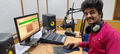 RJ Harsh poses for camera while working at Radio Awaj 90.8 FM Dahoding station