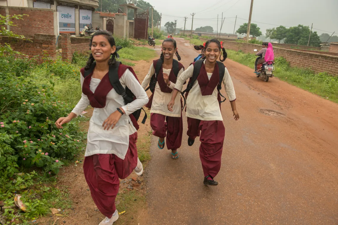 Kushma Kumari(15), Priyanshi Kumari (13), Barkha Kumari (14), on their way to Pirra government school in Kanke block of Ranchi in the central Indian state of Jharkhand.