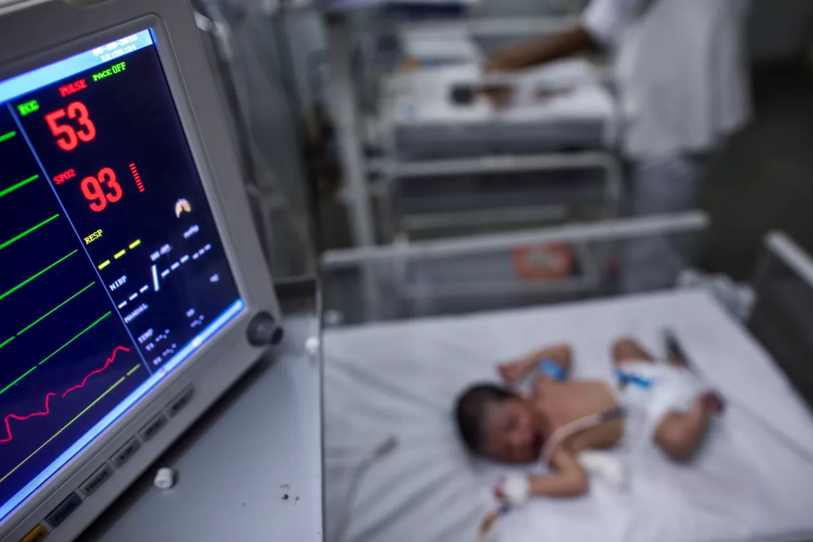 A child connected to monitoring equipment in SNCU.