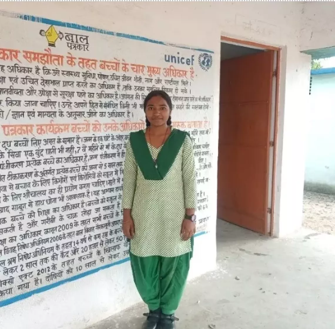 Child Reporter Dipika Kumari outside her school in in eastern state of Jharkhand