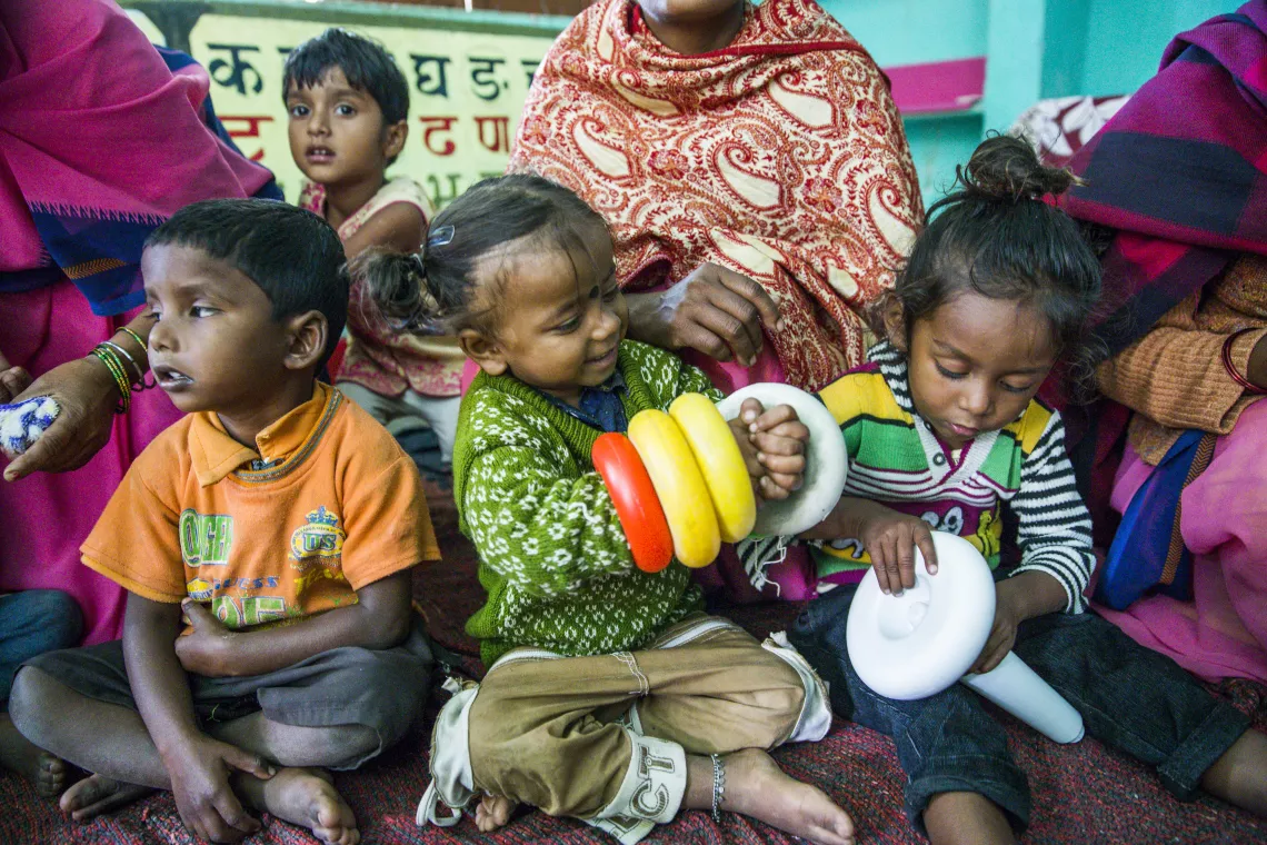 Children play with toys at the Anganwadi Children&rsquo;s centre in Gandhigram Village.