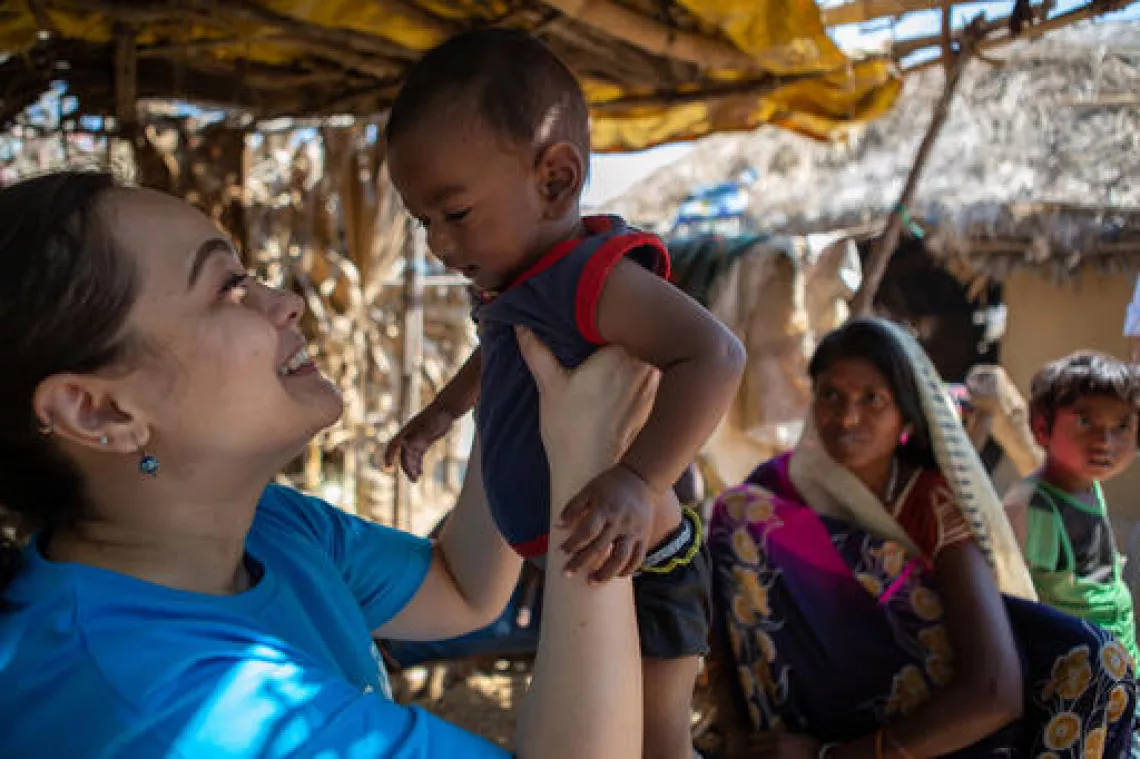 Neha Chhetri, a UNICEF staff, from the headquarters in New Delhi, visits seven month old Dhanraj Kumar, to reflect on his successful story of recovery. 