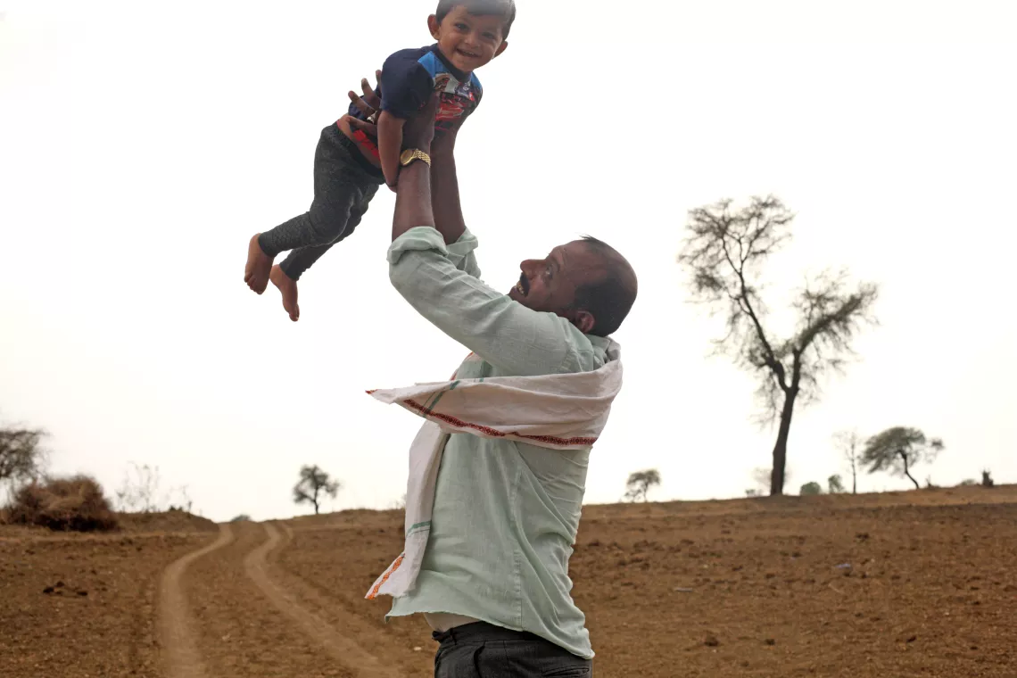 Sachin Chaudhary 35 &ndash; year &ndash; old, playing with his 2 &ndash; year old son Krishna Chaudhary.