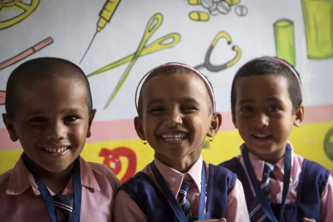 Children appear happy and busy. Children approach the teachers/caregivers freely at any time. Ganjam District, Odhisa.