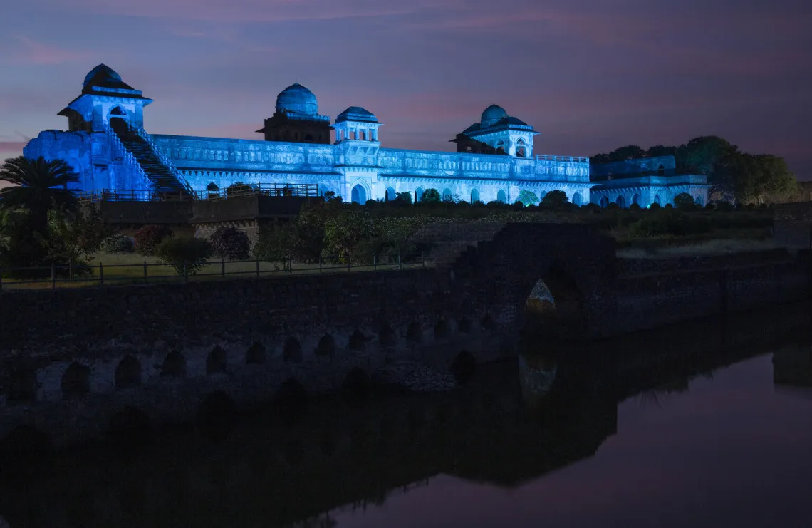 The building is blue with lights