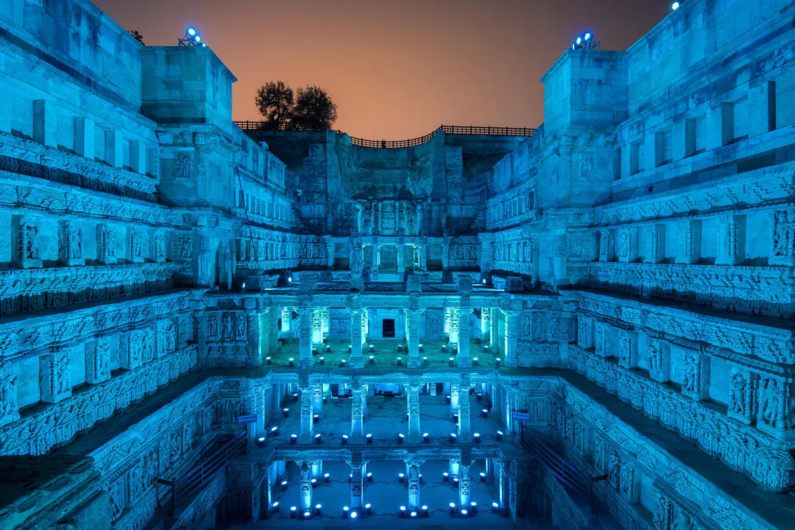 A stepwell is turned blue with lights
