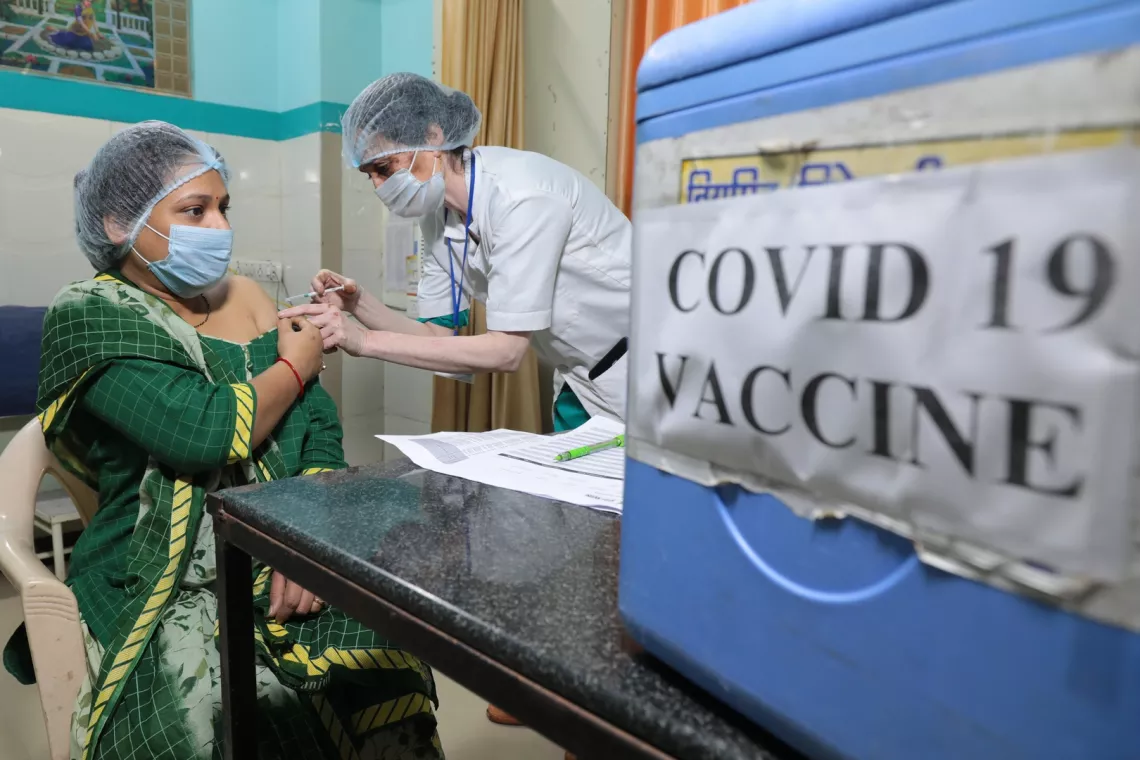 Dry run for COVID19 vaccine being held in Dhar, Madhya Pradesh, showing health care workers receive SMS for vaccination, waiting at the center and following other protocols during the nation wide dry run.