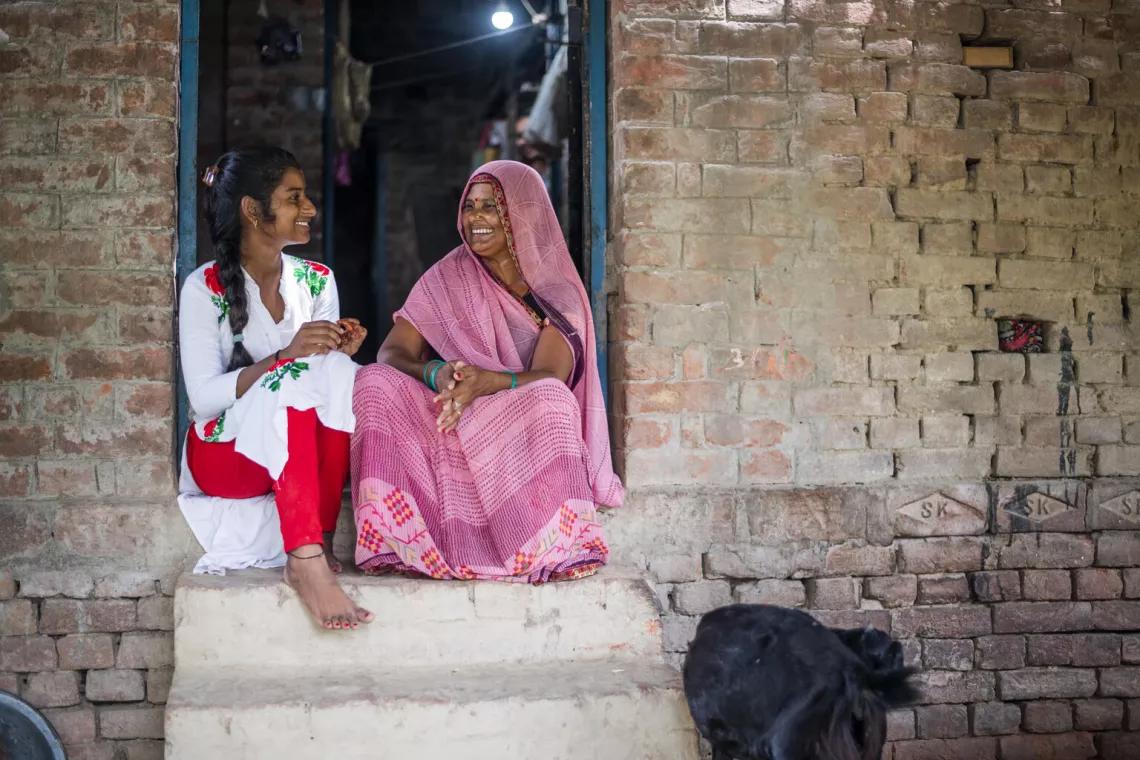 Nineteen-year-old Radhika reacts as she interacts with her 45 years old mother Durgavati Devi at her house at Amini in Varanasi, Uttar Pradesh