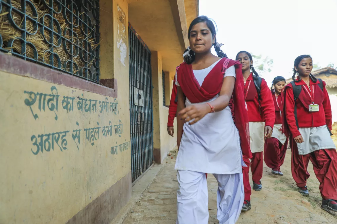 Vinita walking in school.