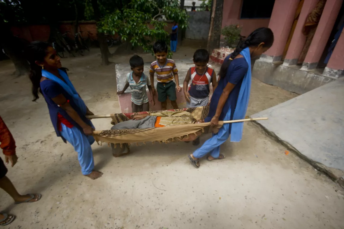 Students take part in an earthquake evacuation drill outside their classroom at Middle School in Madhubani District, Bihar.