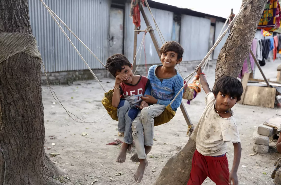 Children of migrant labours play near brick kiln site in Pawan Nagar in Nashik, Maharashtra.