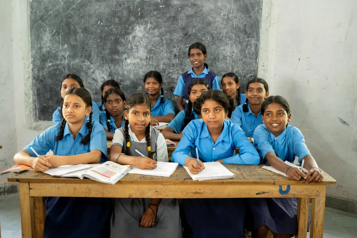 Anushka Kumari, an 11-year-old class 6 student in a grey tunic, is in her classroom at KGBV Ararchi in Purnia. Thanks to UNICEF and the District Education Office's efforts under Samagra Shiksha, teachers and students are learning Indian Sign Language for better communication.