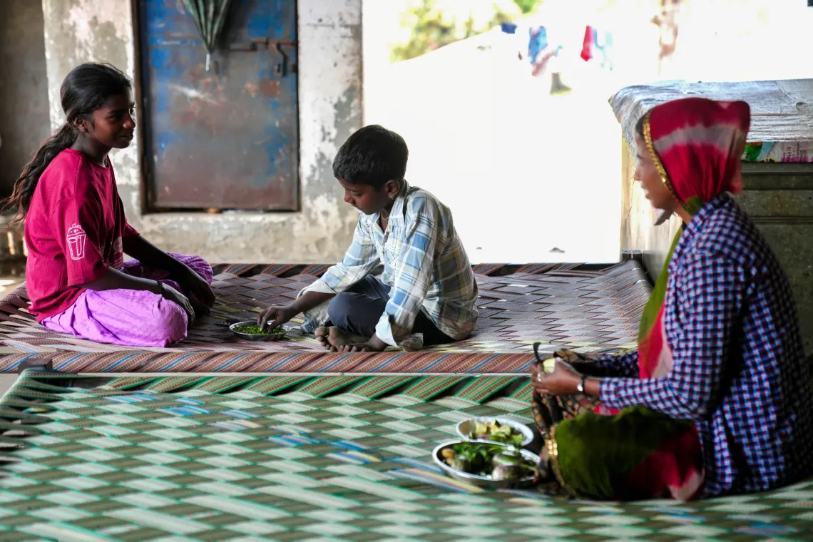 Lali is one among many women who have been empowered through the watershed initiative. She brings back vegetables to cook a nutritious meal for her children. 