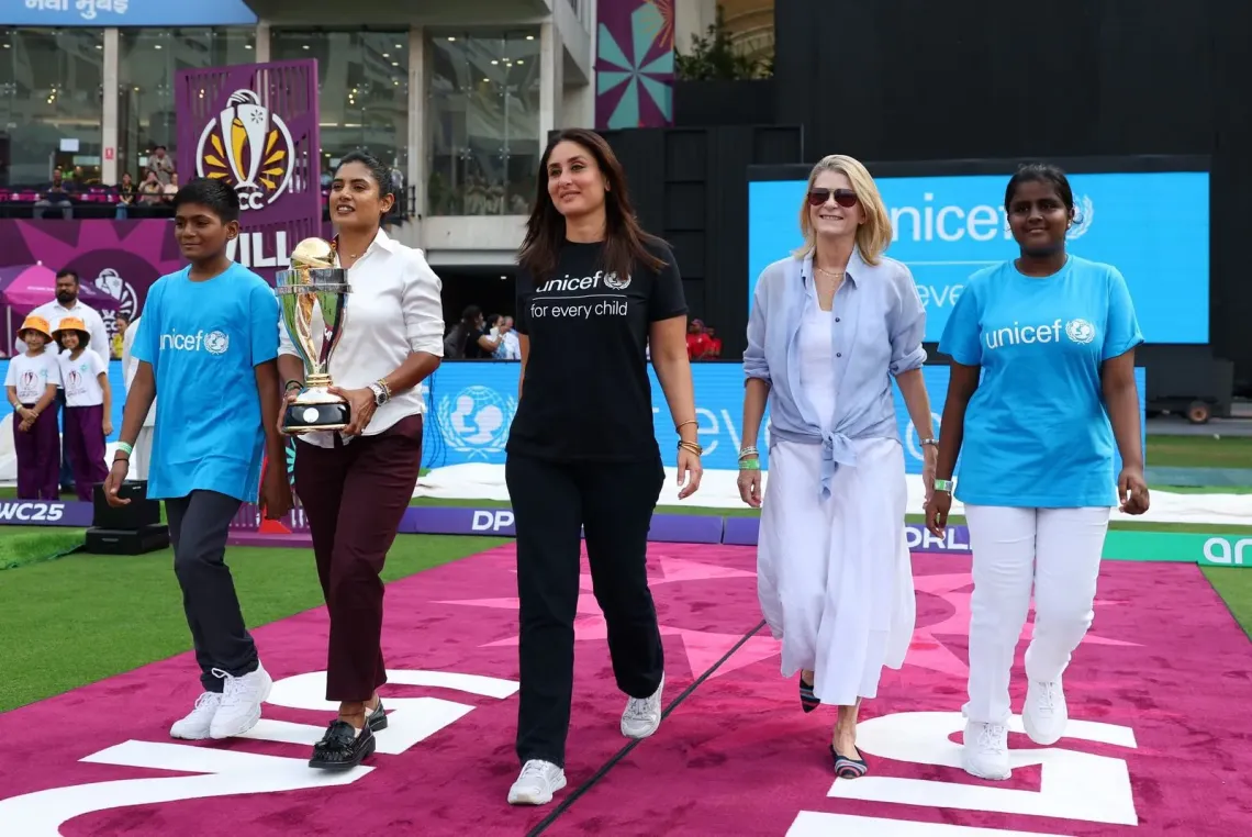 Walking out with the ICC Trophy