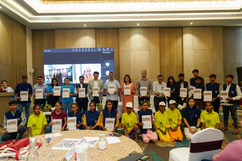 Government of India officials, UNICEF representatives, and adolescent youth hold up a report at the launch of a joint initiative on adolescent mental health &mdash; representing youth-centred mental health policy, child rights, and multi-stakeholder action in India.