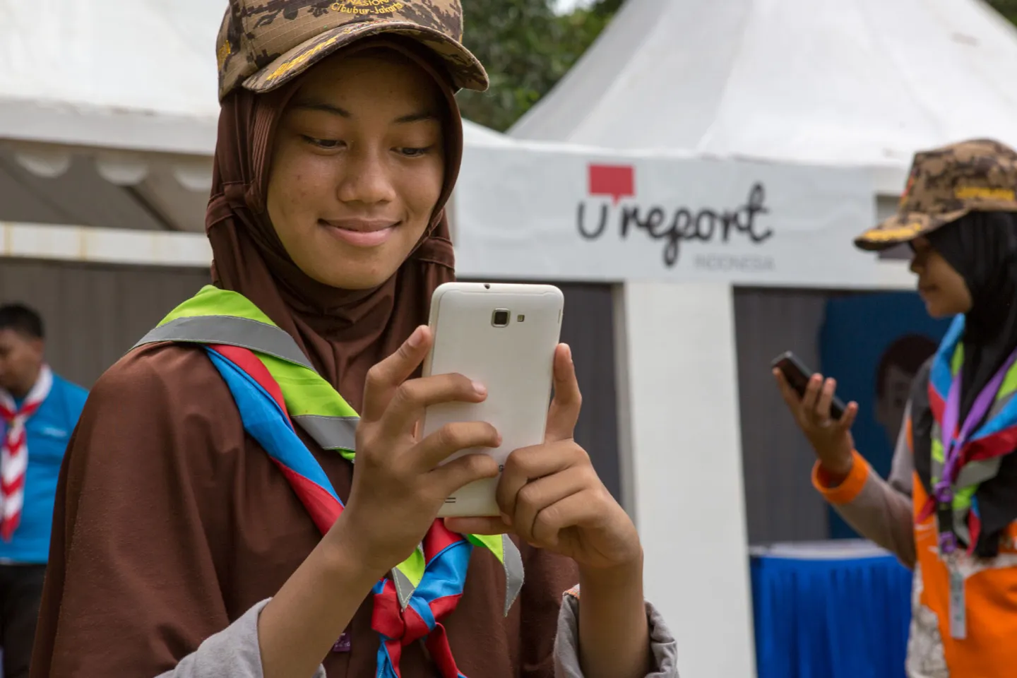 A girl texting on her mobile phone.