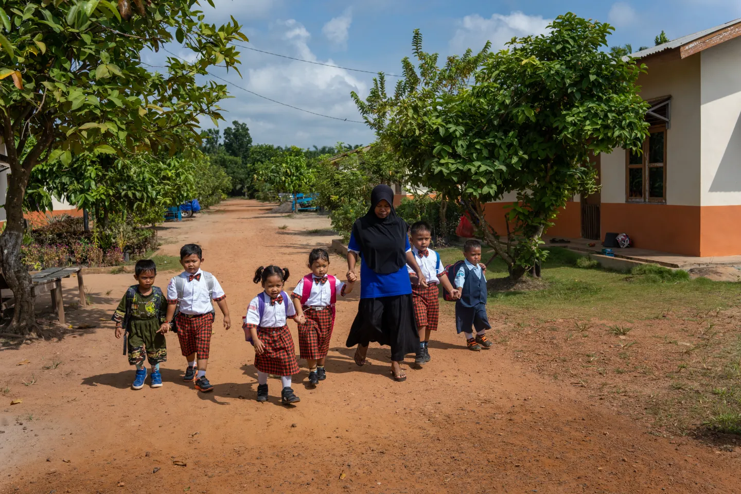 Children walking to daycare