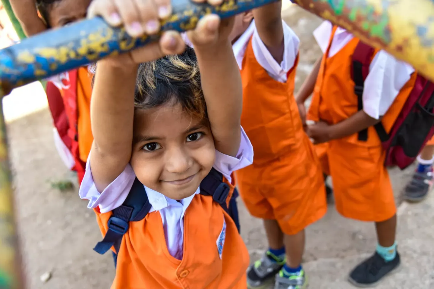 a student plays an outdoor activity at the schoolyard 
