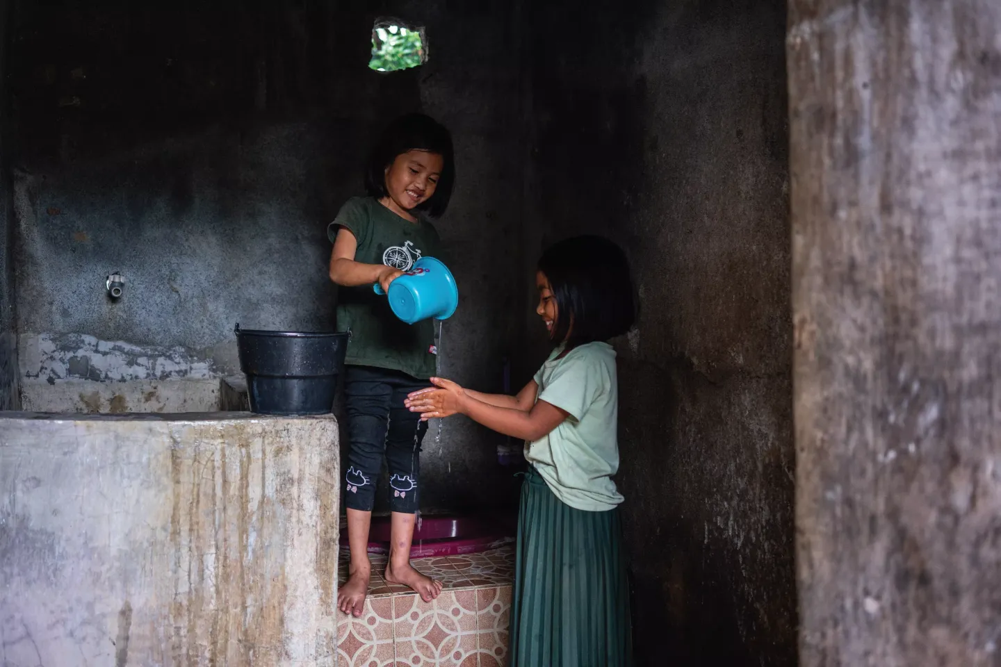 Girls washing their hands