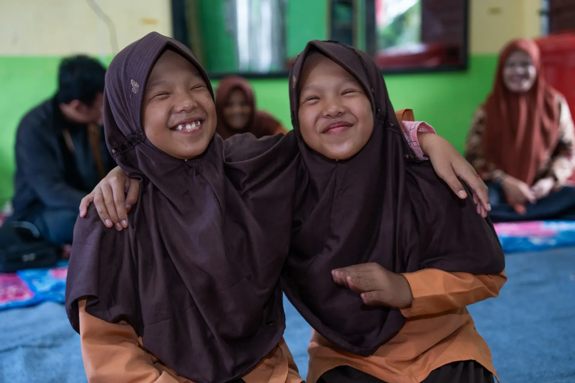 Two girls' students of SLB YPPC, Banda Aceh smiling