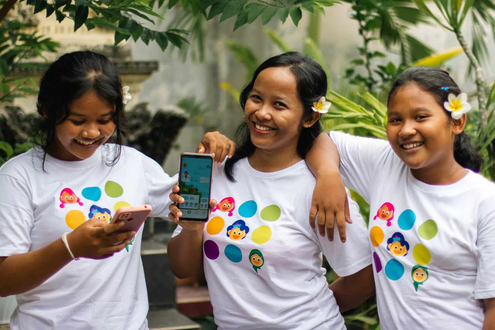 Teenage girl showing Oky app.