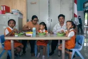 Students eat their school meals together with parents at the TKN Kelapa Lima Public Early Childhood Education (ECE) Centre, Kupang Municipality, East Nusa Tenggara, on 9 December 2025