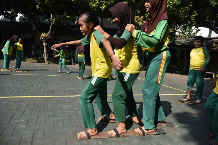 Children playing games in the school yard