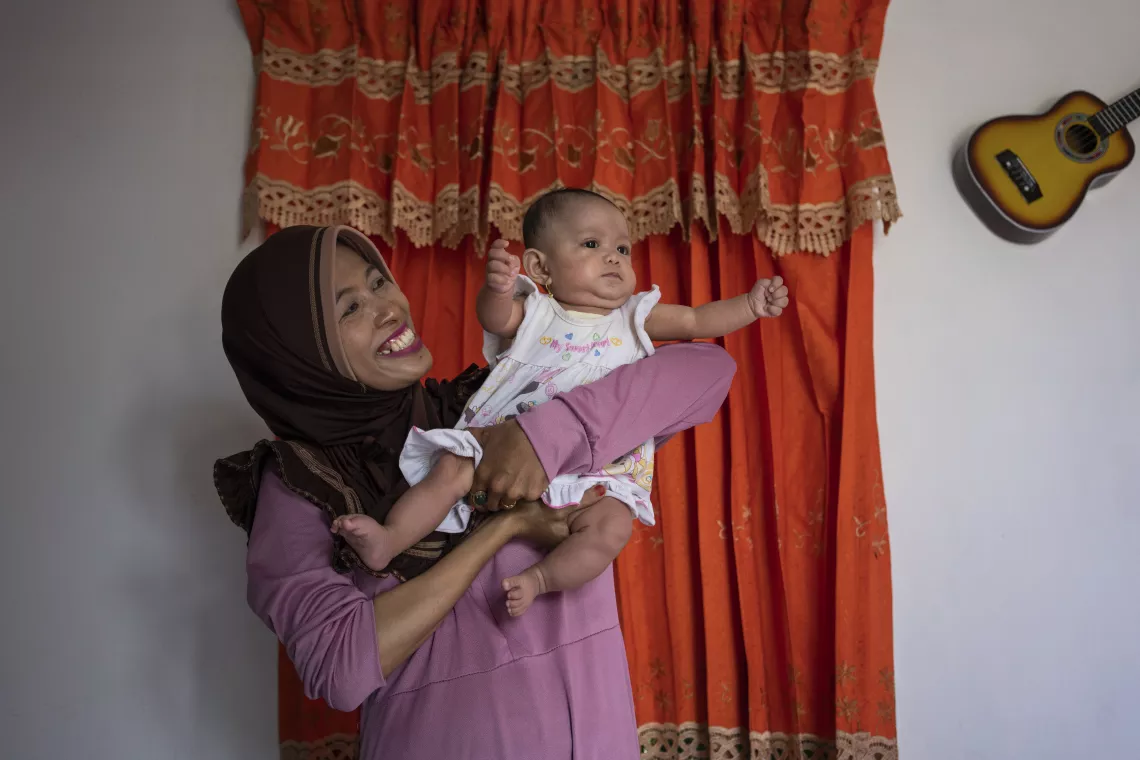 Ibu Ratna and baby