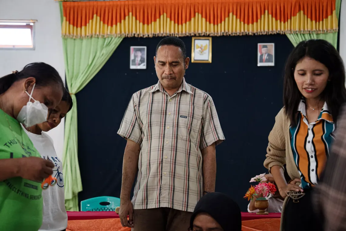 Agustinus Sendoren Piran or Agus, 45, a visually impaired person who is also a facilitator for STBM-GEDSI in East Flores, during an orientation event with villagers in Desa Mokantarak, East Nusa Tenggara. 