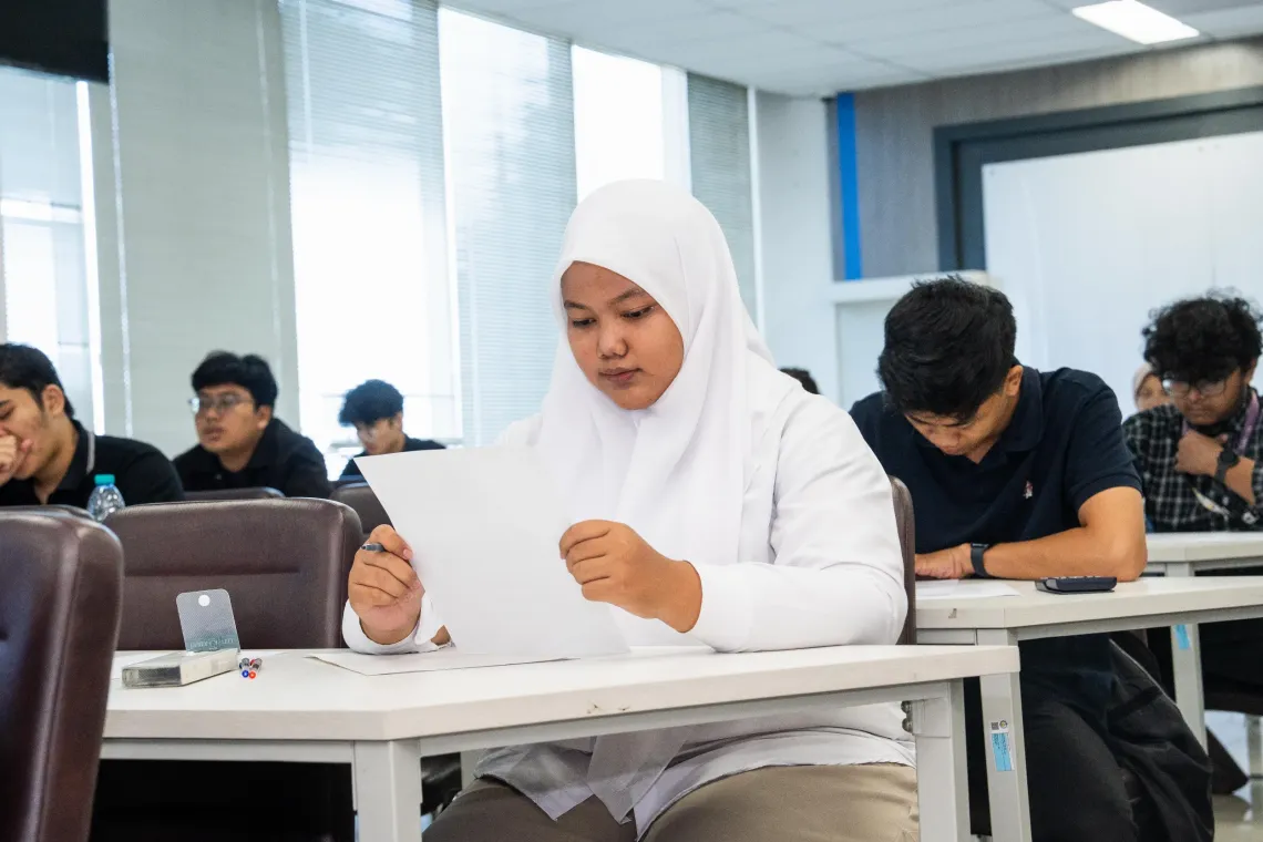 Vian during an exam at the Institut Teknologi Sepuluh November (10th of November Technology Institute), Surabaya, East Java on 22 September 2025.