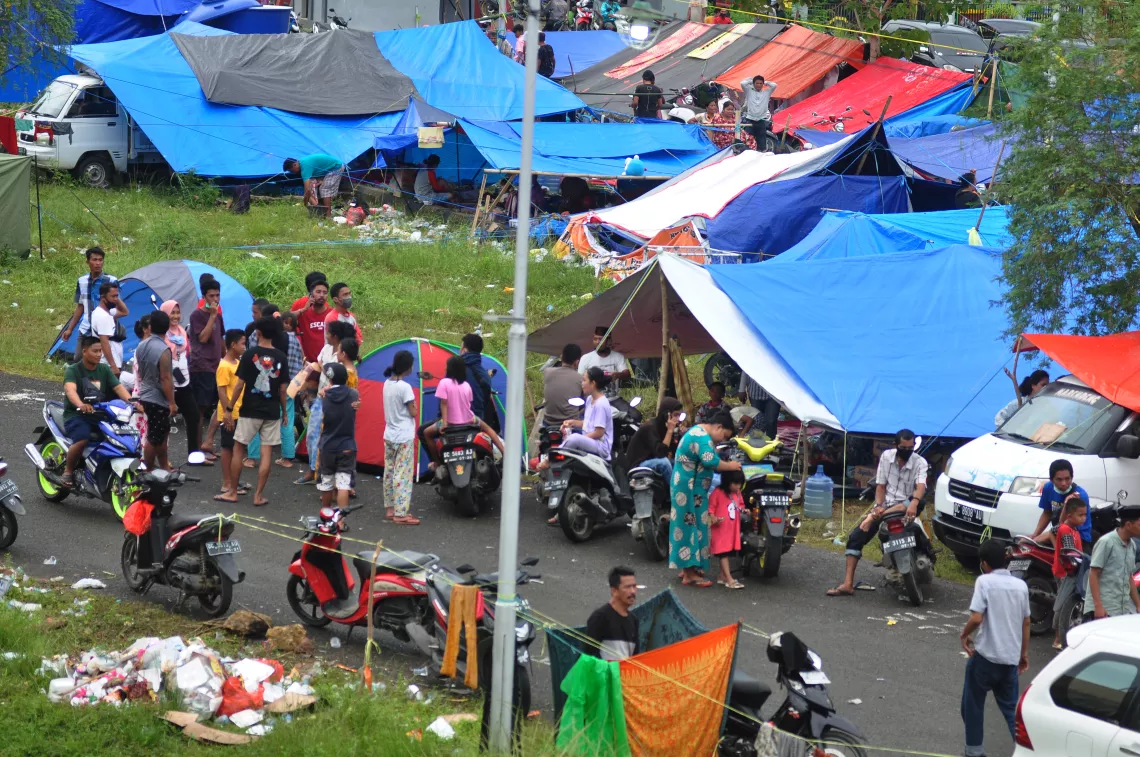 On 17 January 2020, earthquake survivors gather at a temporary shelter at Manakkara Stadium in Mamuju Regency, West Sulawesi, Indonesia. According to the National Disaster Mitigation Agency (BNPB), there are currently 27,000 survivors living in 30 shelters in Majene and Mamuju regencies. 