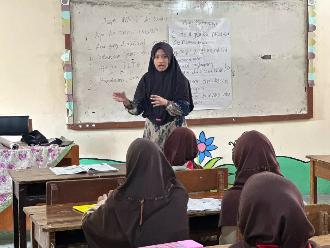 Afifah facilitated an education session in a class