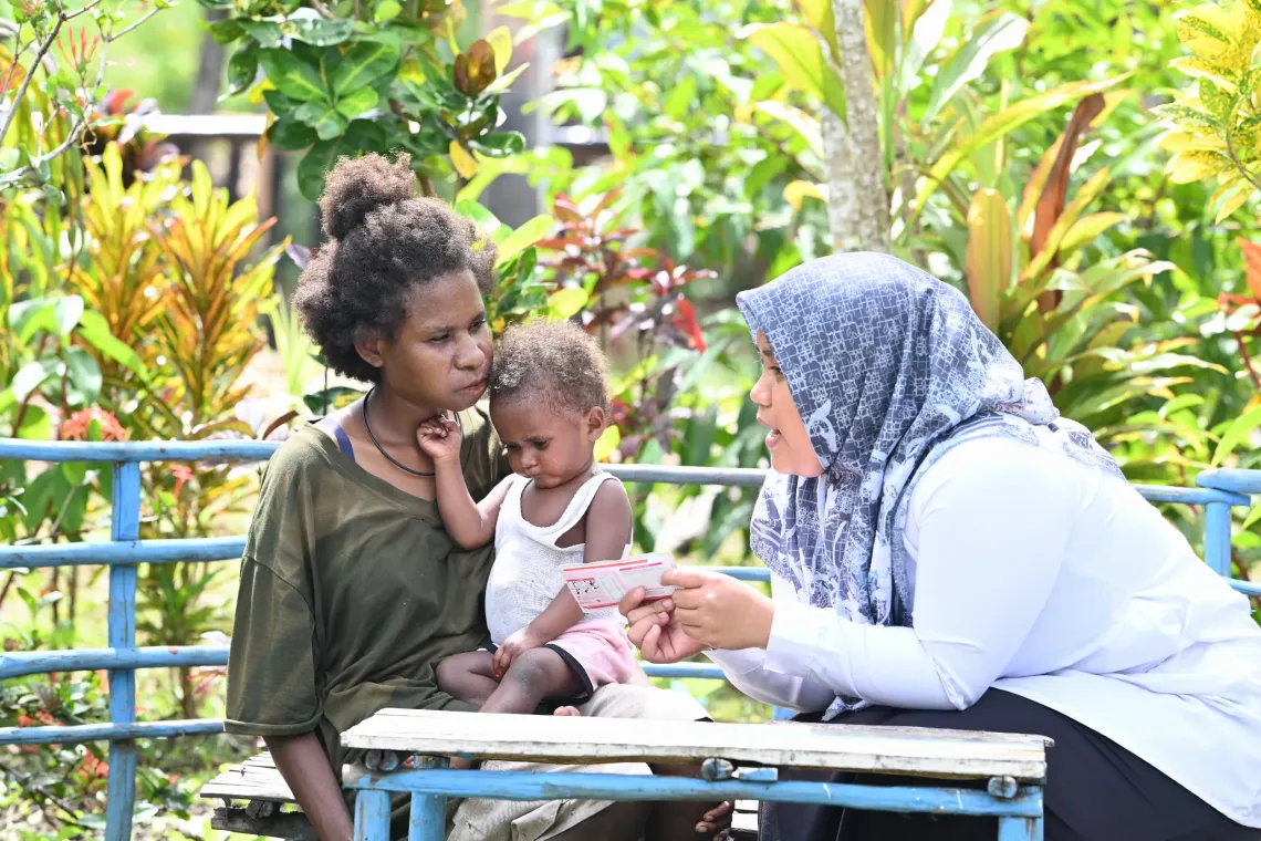 Margaretha and Maria meet with a health worker