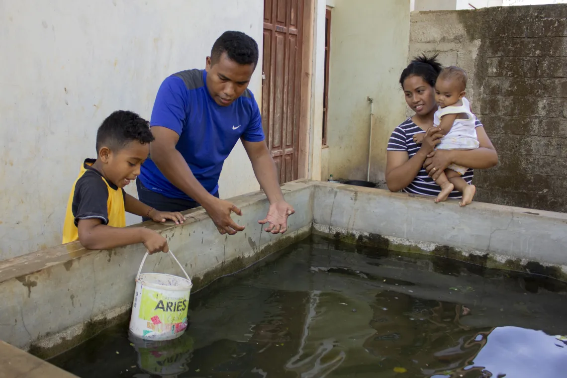 El-Asamau with his wife and two children