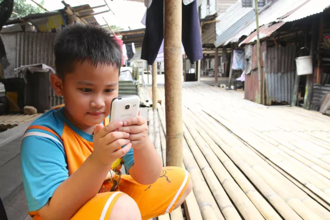 Boy using smartphone