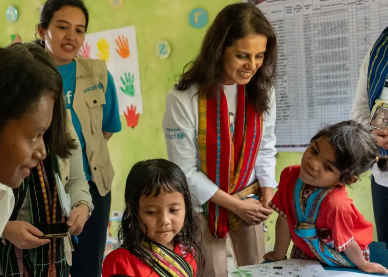 Maniza Zaman and students in a class