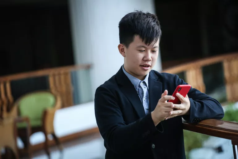 Boy using smartphone
