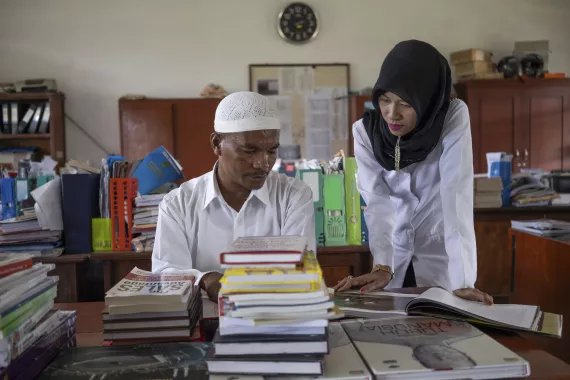Ibu Ratna and colleague
