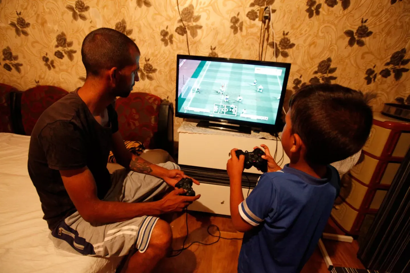 Two children playing a video game