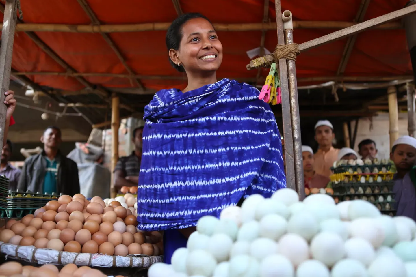Woman selling eggs in Bangladesh