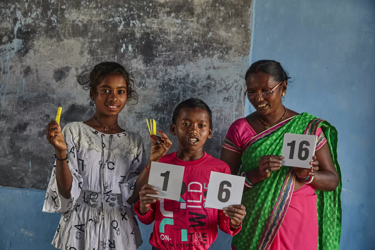 A teacher and her students at a school in India