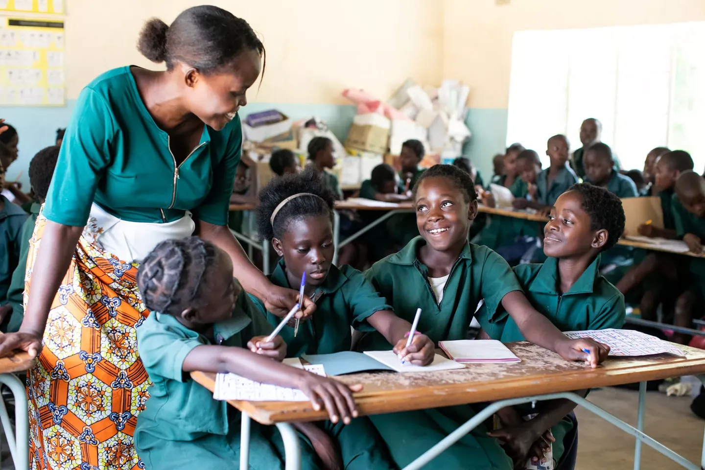 A teacher and students in a classroom