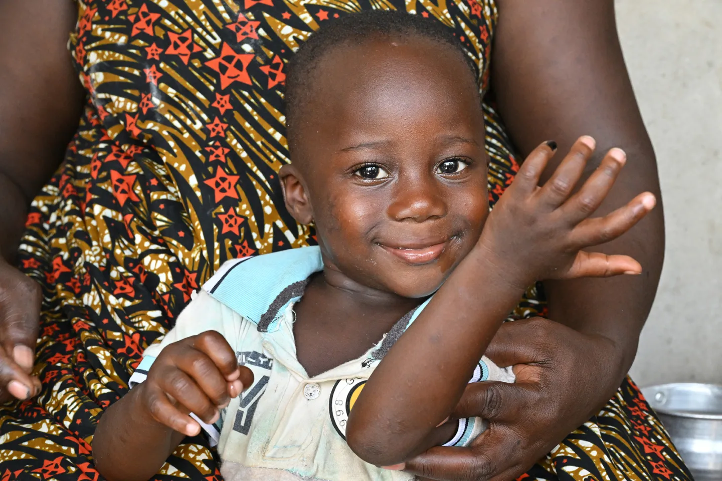 A 3 year old boy received a vitamin A supplement in a village in C&ocirc;te d'Ivoire