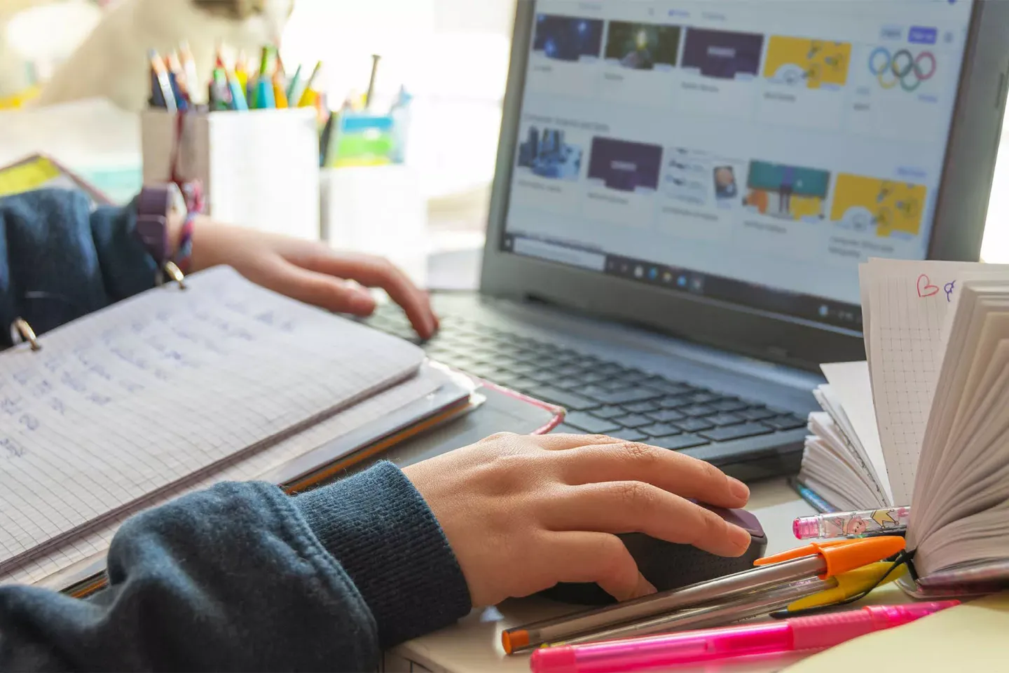 A child working on a laptop