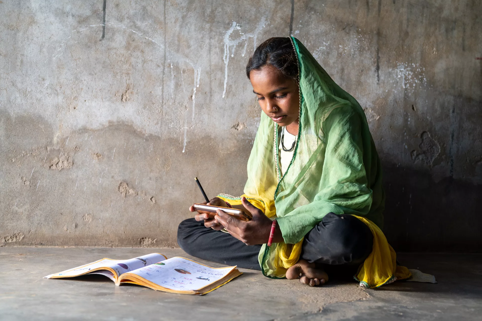 Anish, 11, studies at home in Dharewada village, Banaskantha, Gujarat, as schools are closed due to the COVID-19 pandemic.